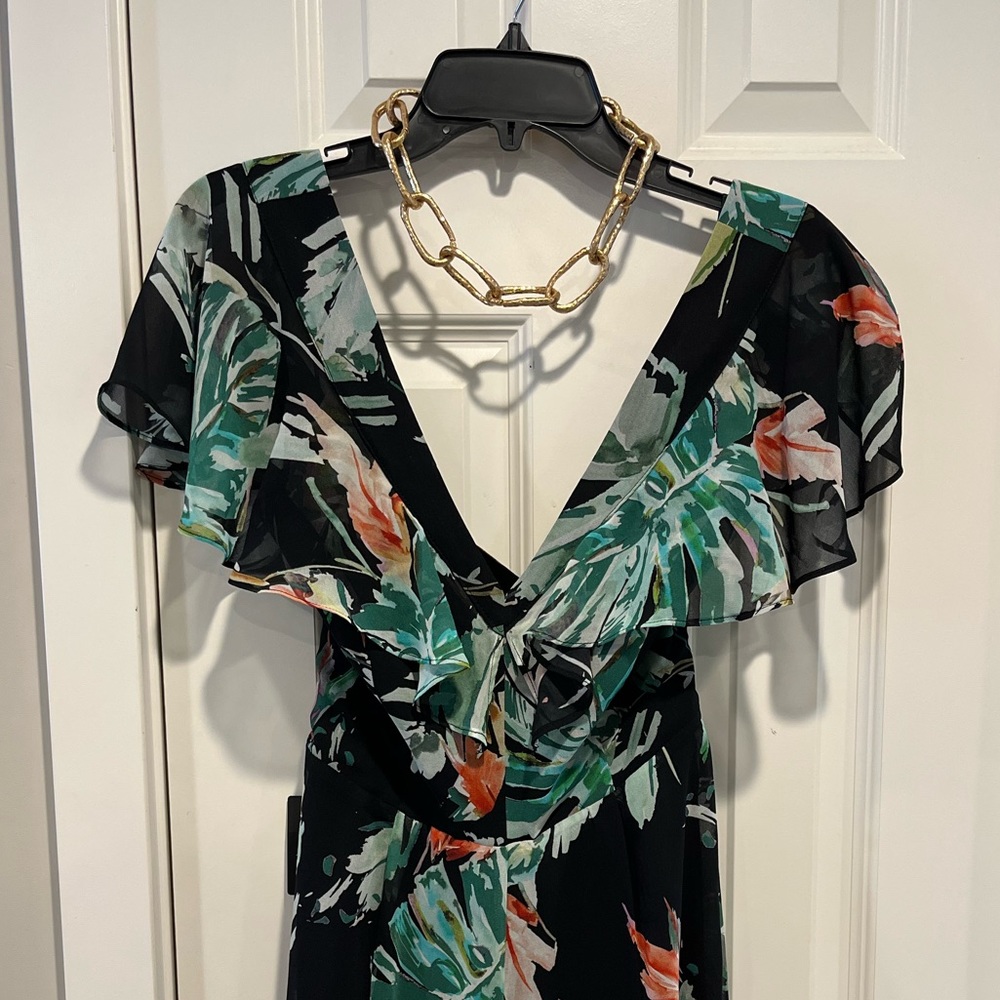 016 NWT Bebe Black Floral Flutter Sleeve Jumpsuit 🌴